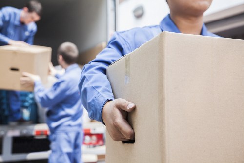 Moving team preparing a home move in a Lambeth residential street