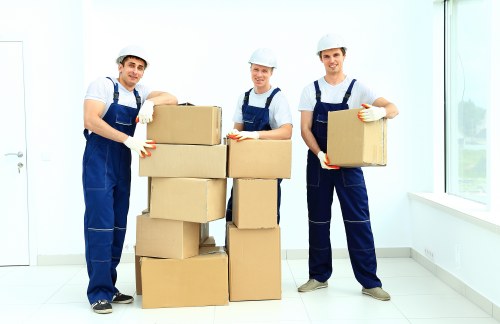 Man with van moving boxes and furniture during a house move