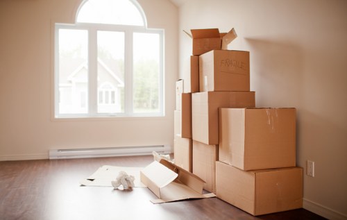 Removalists loading household furniture for a move in Lambeth
