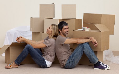 Delivery van and movers completing a transport service