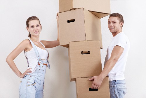 Careful loading of household items for transport in Lambeth