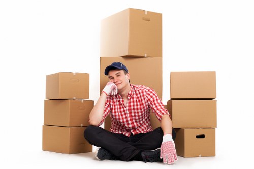 Packed office boxes and equipment ready for relocation in Lambeth
