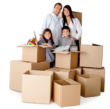 Packed moving boxes and furniture ready for transport in Lambeth